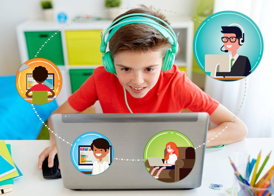 Students collaborating in a Coding with Kids group class