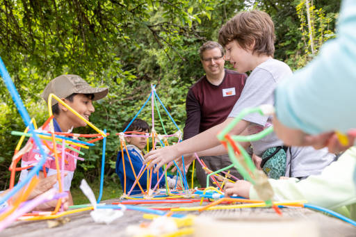 Students collaborating at a Coding with Kids camp