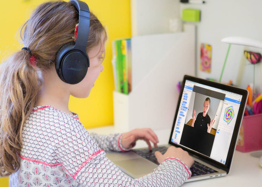 Student learning with a Coding with Kids instructor